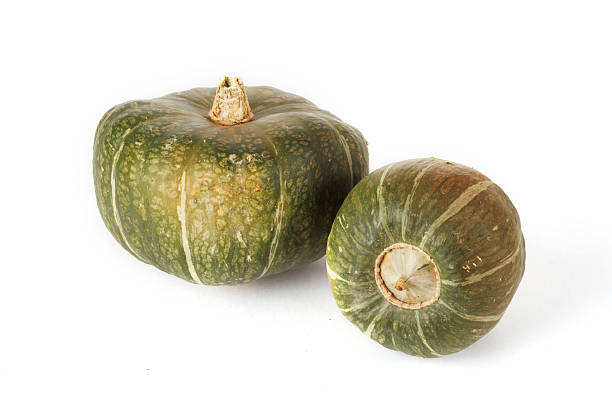 Stock Photo of Buttercup Squash Two buttercup squashes sit on a white background. squash vegetable stock pictures, royalty-free photos & images