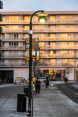 Stockholm, Sweden Jan 1, 2021 People waiting at a tram stop in Liljeholmen.