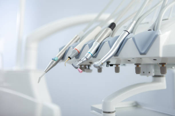 Stomatological instrument in the dentists clinic. Dental high speed turbine. Dental work in clinic. Medicine, health, stomatology concept. stock photo