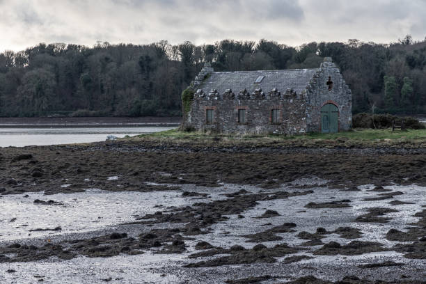 Stone house and Strangford lough Stone house and Strangford lough, Northern Ireland, UK strangford lough stock pictures, royalty-free photos & images