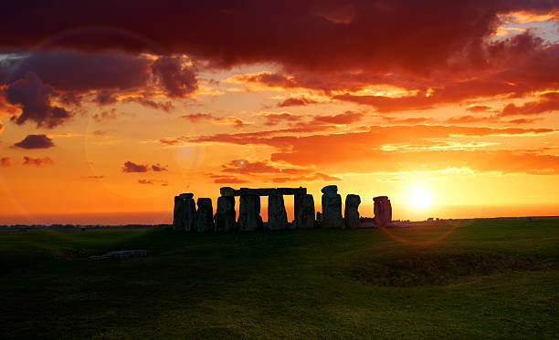 Stonehenge Sunset A composite image of the ancient neolithic monument of Stonehenge in Wiltshire, England.  megalith stock pictures, royalty-free photos & images