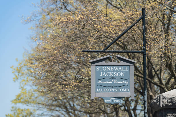 Stonewall Jackson Memorial Cemetery sign for gravesite and tomb of confederate general in Lexington, Virginia Lexington, USA - April 18, 2018: Stonewall Jackson Memorial Cemetery sign for gravesite and tomb of confederate general in Virginia stonewall jackson stock pictures, royalty-free photos & images