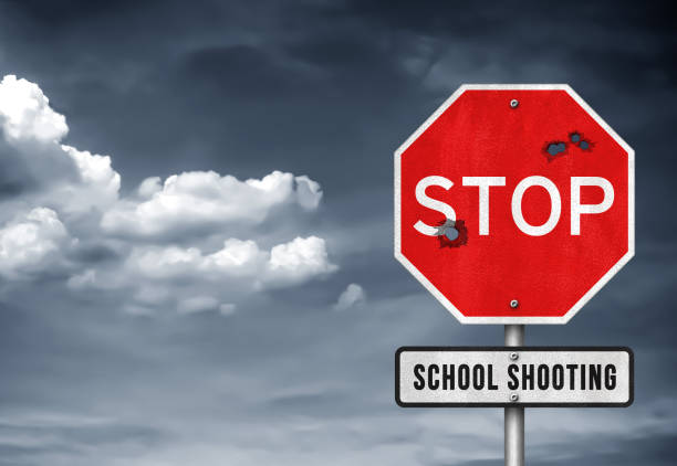 Stop school shooting - road sign stock photo
