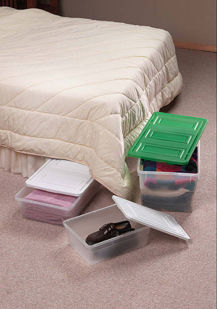 storage containers in bedroom stock photo
