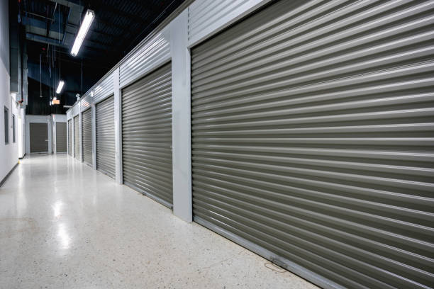 Storage facilities with gray doors. Moving, storage concept. Storage facilities with gray doors. Moving, storage concept. self storage stock pictures, royalty-free photos & images
