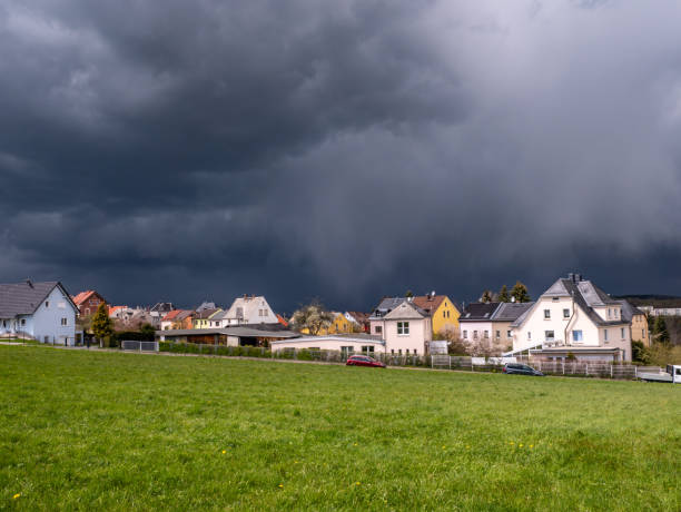 Storm clouds over a village stock photo