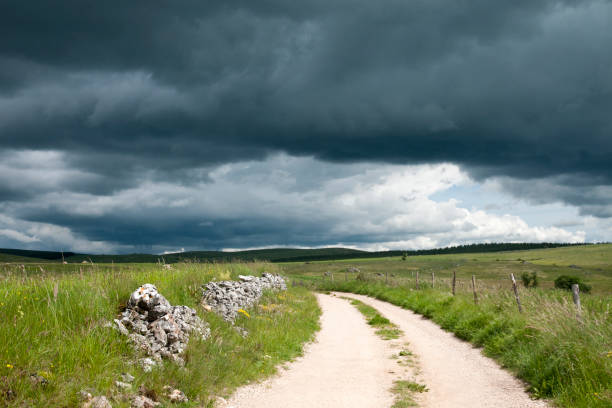 Stormy sky in countryside Stormy sky in countryside - Spring in  Cevennes National Park cevennes national park stock pictures, royalty-free photos & images