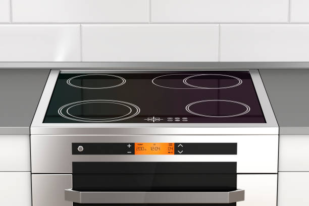 Stove with induction cooktop Modern electric stove with induction cooktop in the kitchen burner stove top stock pictures, royalty-free photos & images