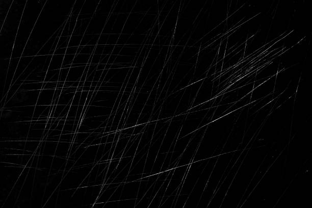 Strached Background Overhead view of dark and strached black metal surface scratched stock pictures, royalty-free photos & images
