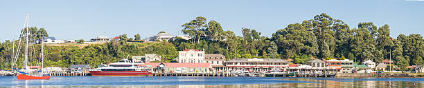 Strahan The tranquil harbor of Strahan in southwestern Tasmania. launceston australia stock pictures, royalty-free photos & images