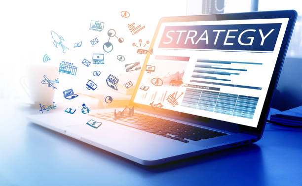 Strategy text with business icon on modern laptop screen stock photo