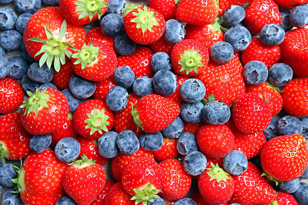 Strawberries and Blueberries Background stock photo