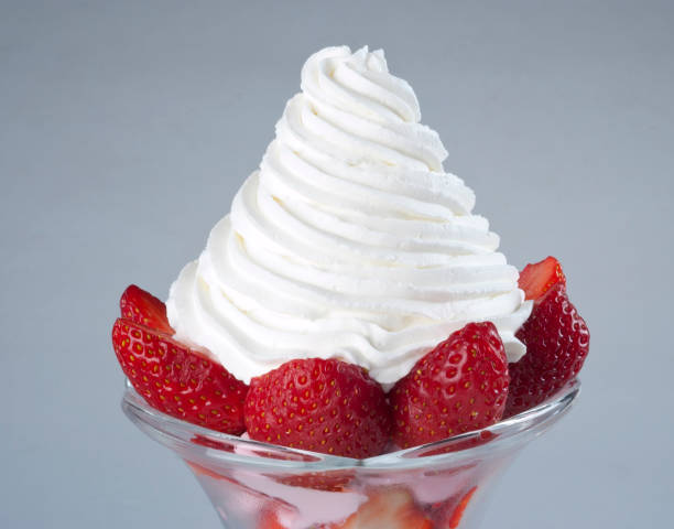 strawberries and whip cream - whipped cream bildbanksfoton och bilder