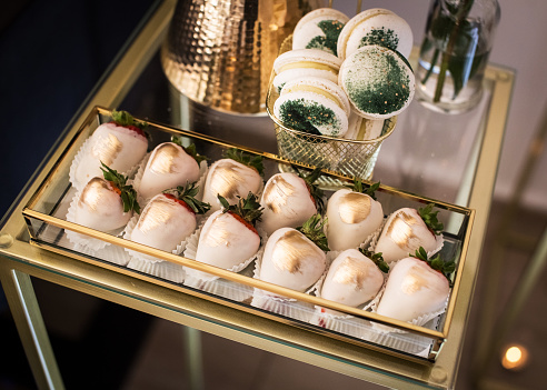 Strawberries covered with white chocolate arranged in a beautiful decorative box