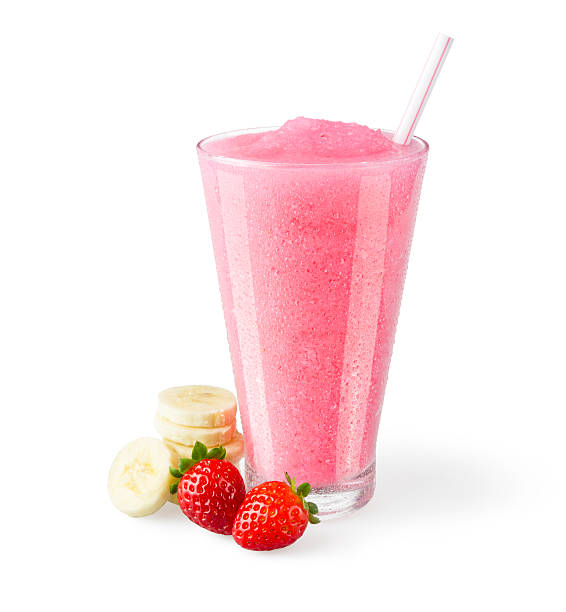 Strawberry Banana Smoothie with Garnish on White Background A strawberry and banana smoothie in a generic glass on a white background. strawberry smoothie stock pictures, royalty-free photos & images