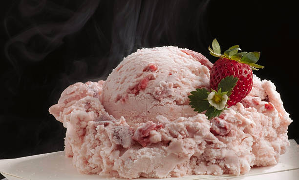 strawberry ice cream scoop on platter stock photo
