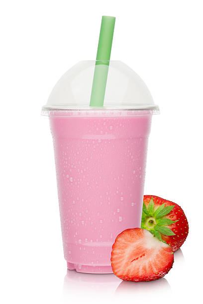 strawberry milkshake with fresh strawberries strawberry milkshake with fresh strawberries on a white background strawberry smoothie stock pictures, royalty-free photos & images
