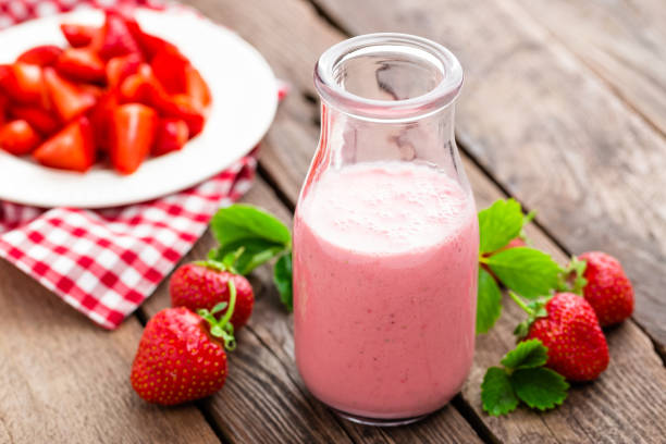 Strawberry yogurt with fresh berries, delicious drink, cocktail Strawberry yogurt with fresh berries, delicious drink, cocktail strawberry smoothie stock pictures, royalty-free photos & images
