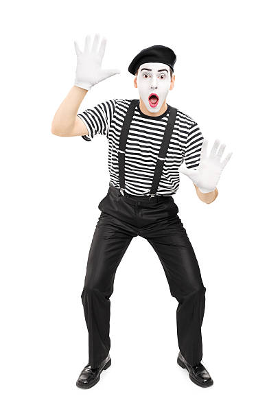 Street artist performing isolated on white background Full length portrait of street artist performing isolated on white background mime artist stock pictures, royalty-free photos & images