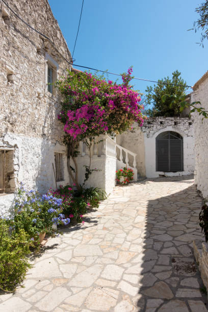 Street in the picturesque village Afionas, Corfu, Greece stock photo