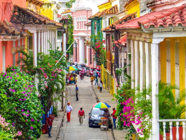 Street in walled city in Cartagena Colombia Street in walled city in Cartagena Colombia with people walking in the walled city and old town on July 21/2019  (note attached) cartagena colombia stock pictures, royalty-free photos & images