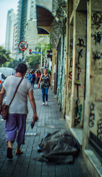 Street photography documenting in an artistic way the urban daily life in the city of São Paulo, Brazil. Selective focus. Special lens, large aperture and tilt-shift built by the photographer. stock photo