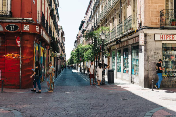 Street scene in Malasaña district in Madrid Madrid, Spain - July 9, 2017: Street scene in Malasaña district in Madrid. Malasaña is one of the trendiest neighborhoods in Madrid, well known for its counter-cultural scene. madridshop stock pictures, royalty-free photos & images