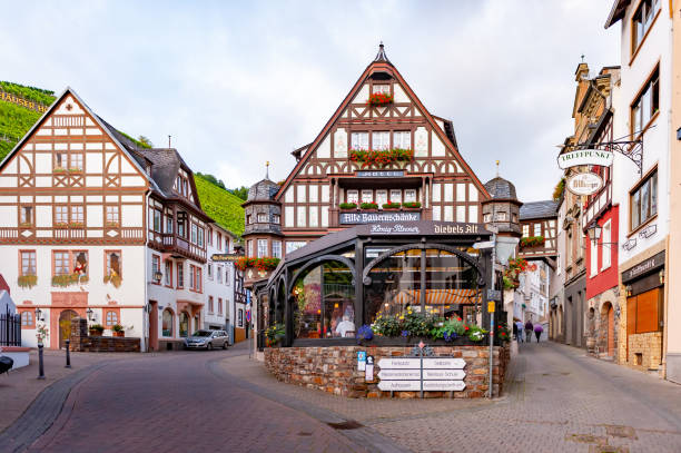 Street View at Rudesheim, Germany (Rüdesheim am Rhein) Rudesheim, Germany - September 2, 2014: The street View at Rudesheim, Germany. The outside wall of building with local cultural decor. hesse germany stock pictures, royalty-free photos & images