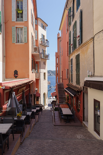Villefranche-sur-Mer, France - May 12, 2022: Street view in Villefranche old town, is a small seaside city on French Riviera