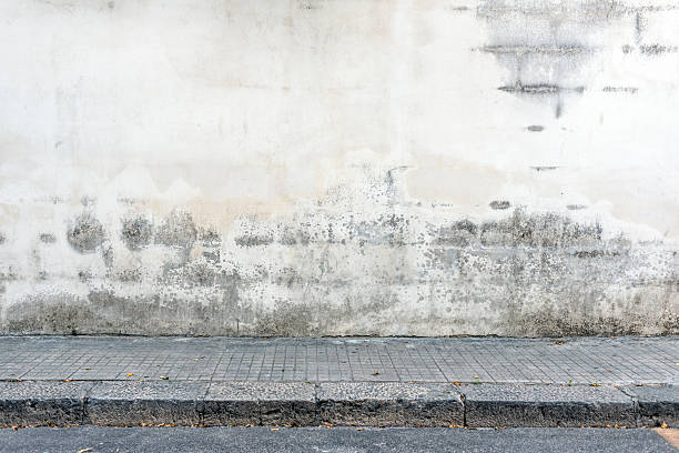 street wand hintergrund - betonwand stock-fotos und bilder