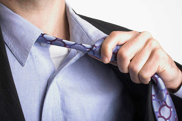 Loose Tie Stock Photos, Pictures & Royalty-Free Images - iStock