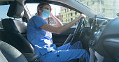 istock Stressed out nurse in car after long day treating patients 1294095574