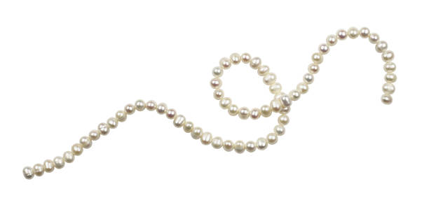String of freshwater pearls String of freshwater pearls isolated on white pearl jewelry stock pictures, royalty-free photos & images