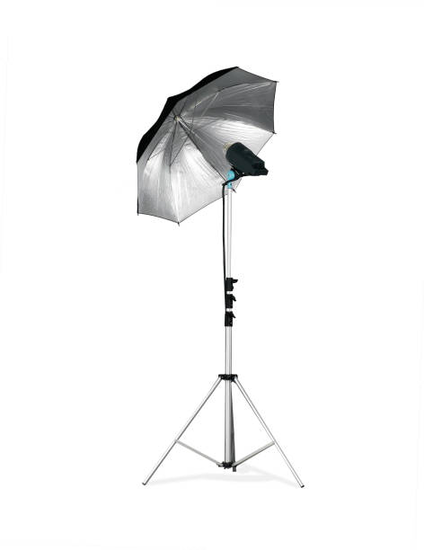 Strobe light with umbrella attachment Lightning equipment isolated on white background lighting equipment photos stock pictures, royalty-free photos & images