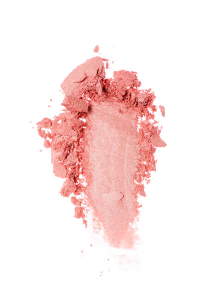 Stroke of crushed shiny pink eyeshadow Smear of crushed shiny pink eyeshadow as sample of cosmetic product isolated on white background blusher make up stock pictures, royalty-free photos & images