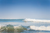 istock Strong wave sea moving wave in daytime in tropical sea beach in bali 1311734310
