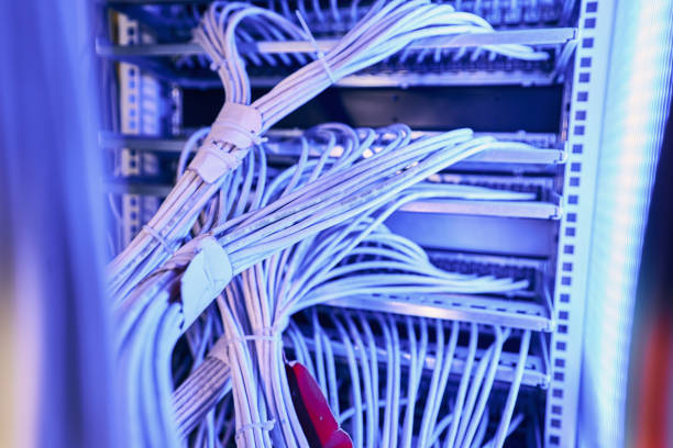 Structured network cabling infrastructure in server room stock photo