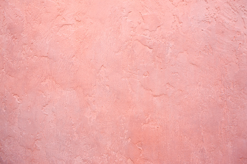 Pink stucco wall background. 