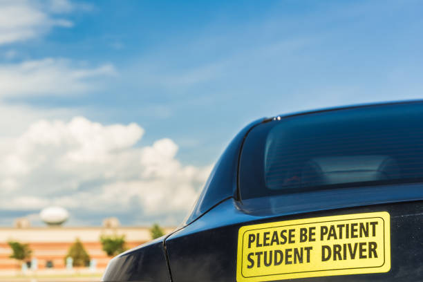 Student driver sign with blue sky background stock photo