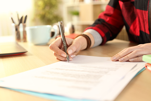 Picture of a student writing a scholarship application