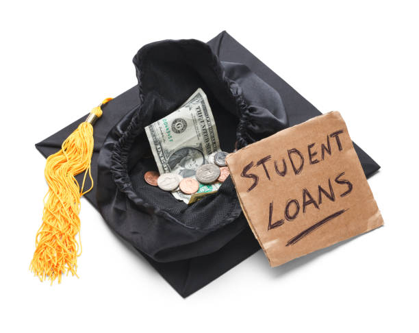 Student Loan Debt Graduation Cap with Moeny and Student Loan Sign Isolated on White Background. student loan  stock pictures, royalty-free photos & images