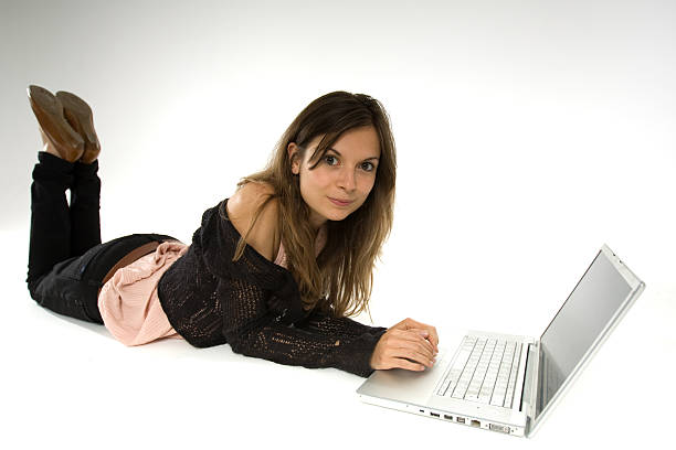 student using laptop stock photo