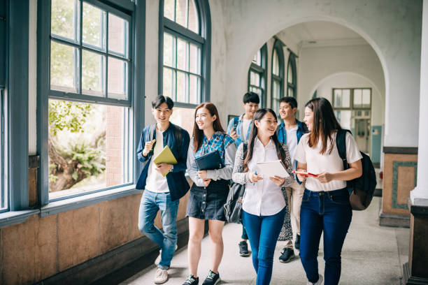 Students back to university after coronavirus. Asian students attend lectures Asian students are back to the high schools and universities after coronavirus lockdown campus stock pictures, royalty-free photos & images