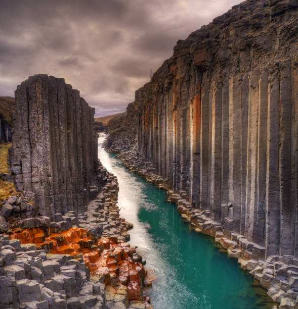 Studlagil basalt canyon, Iceland Studlagil basalt canyon, Iceland. One of the most wonderfull nature sightseeing in Iceland. basalt column stock pictures, royalty-free photos & images