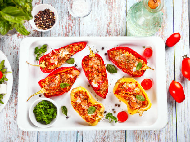 stuffed peppers with meat, rice and vegetables stock photo