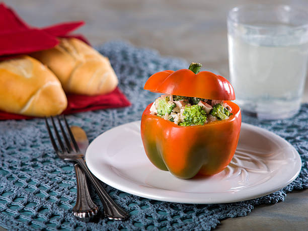 Stuffed Red Pepper with Broccoli Salad stock photo