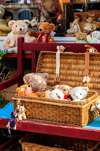 Stuffed toys in a wicker basket