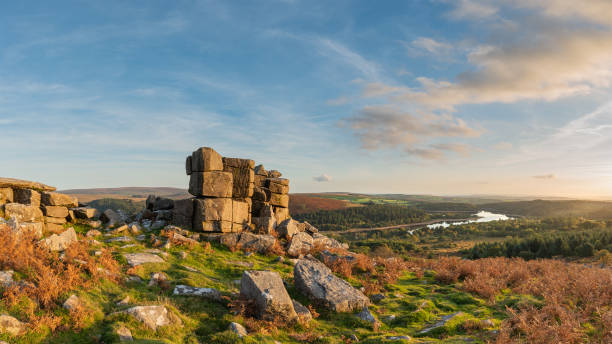 Stunning Autumn sunset landscape image of view from Leather Tor towards Burrator Reservoir in Dartmoor National Park stock photo