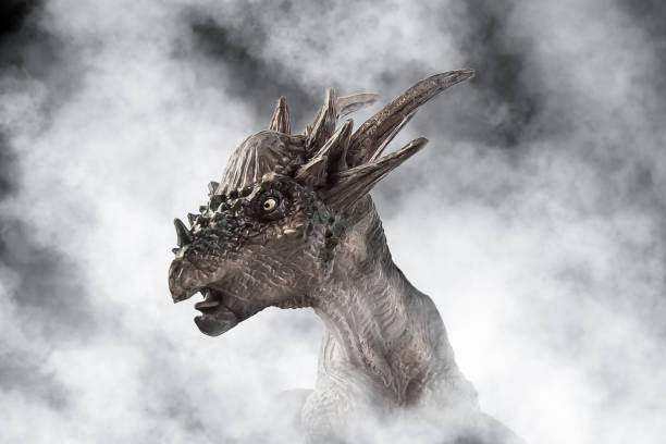 Stygimoloch Dinosaur on smoke background stock photo