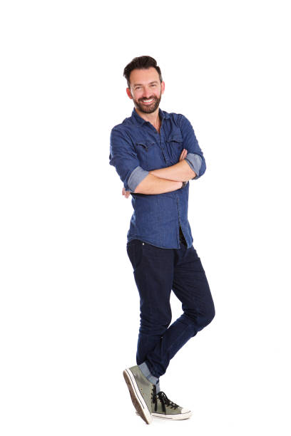 Stylish mature man posing over white background stock photo